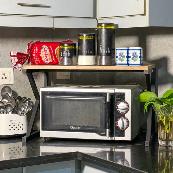 Metal Microwave Shelf a heavy-duty black powder-coated Metal microwave rack modern aesthetic with unmatched stability and style.