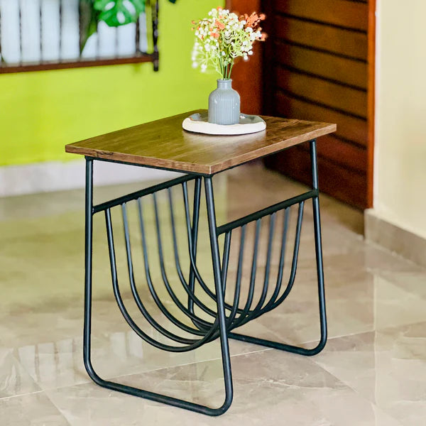 Elevate your living space with the Ferro Round Side Table — finish wood and a sleek matte black metal frame.