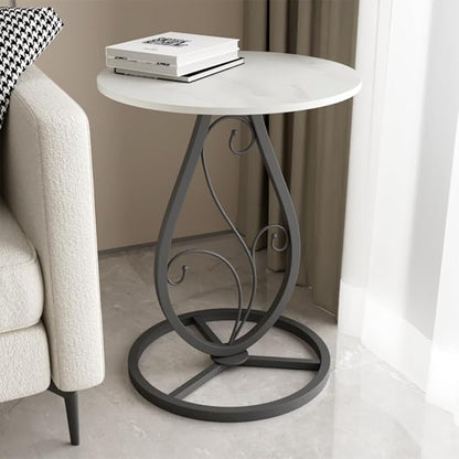 Elegance Side Table – Round White Top with Artistic Black Curved Metal Base. Perfect for Living Rooms, Bedrooms, or Lounges.