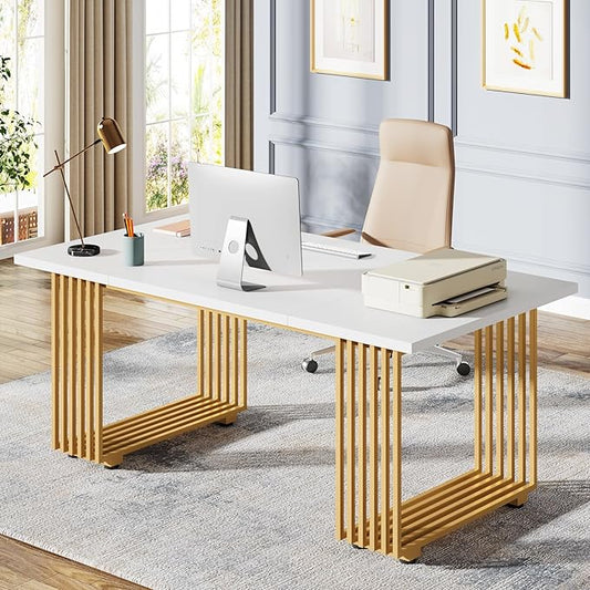 Modern office desk with gold frame and white surface, featuring a laptop and chair.