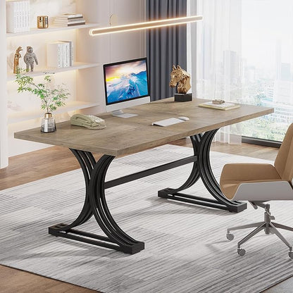 Modern office desk with computer, chair, and decor in a well-lit room.