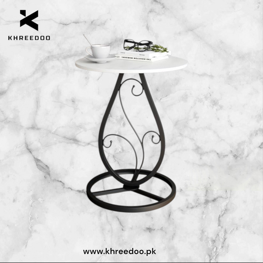 Elegance Side Table – Round White Top with Artistic Black Curved Metal Base. Perfect for Living Rooms, Bedrooms, or Lounges.