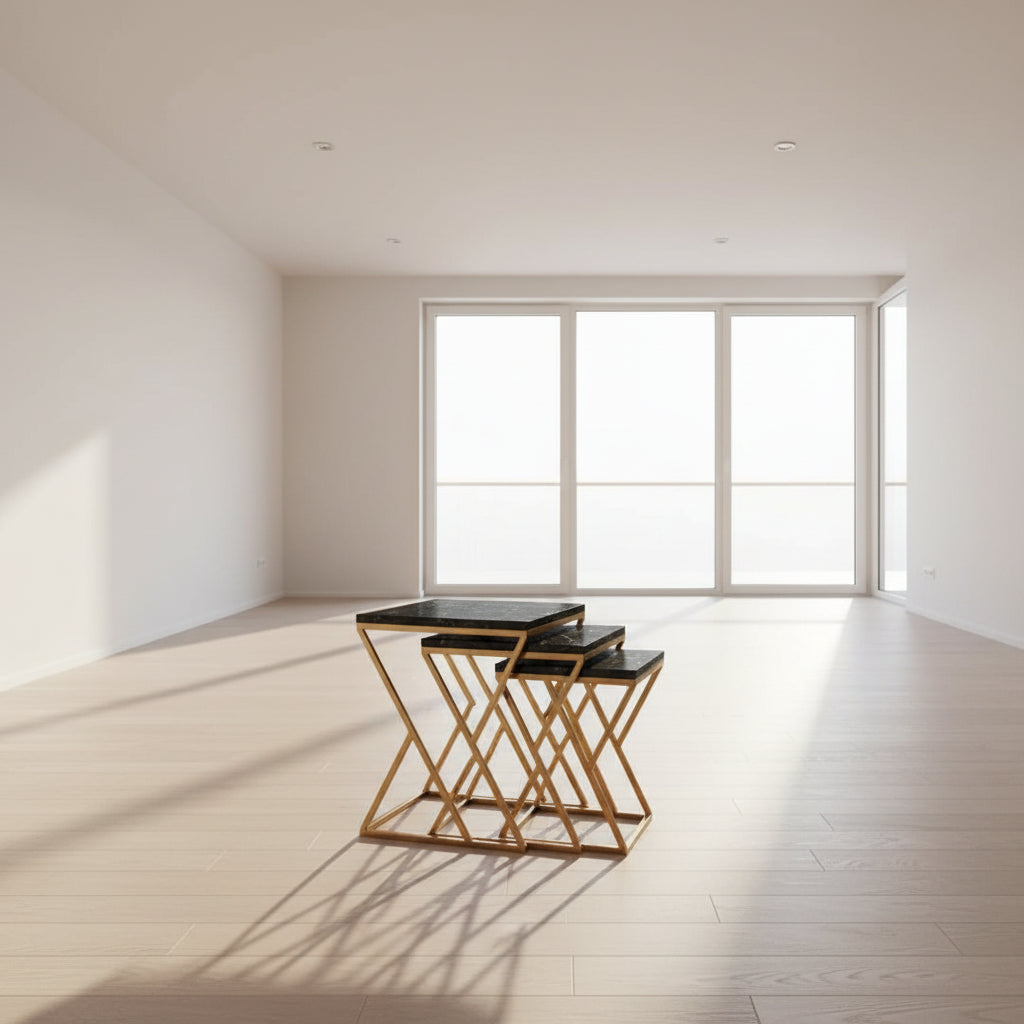 Set of two marble top tables with gold metal frames on a marble background, branded 'Khreedoo'.